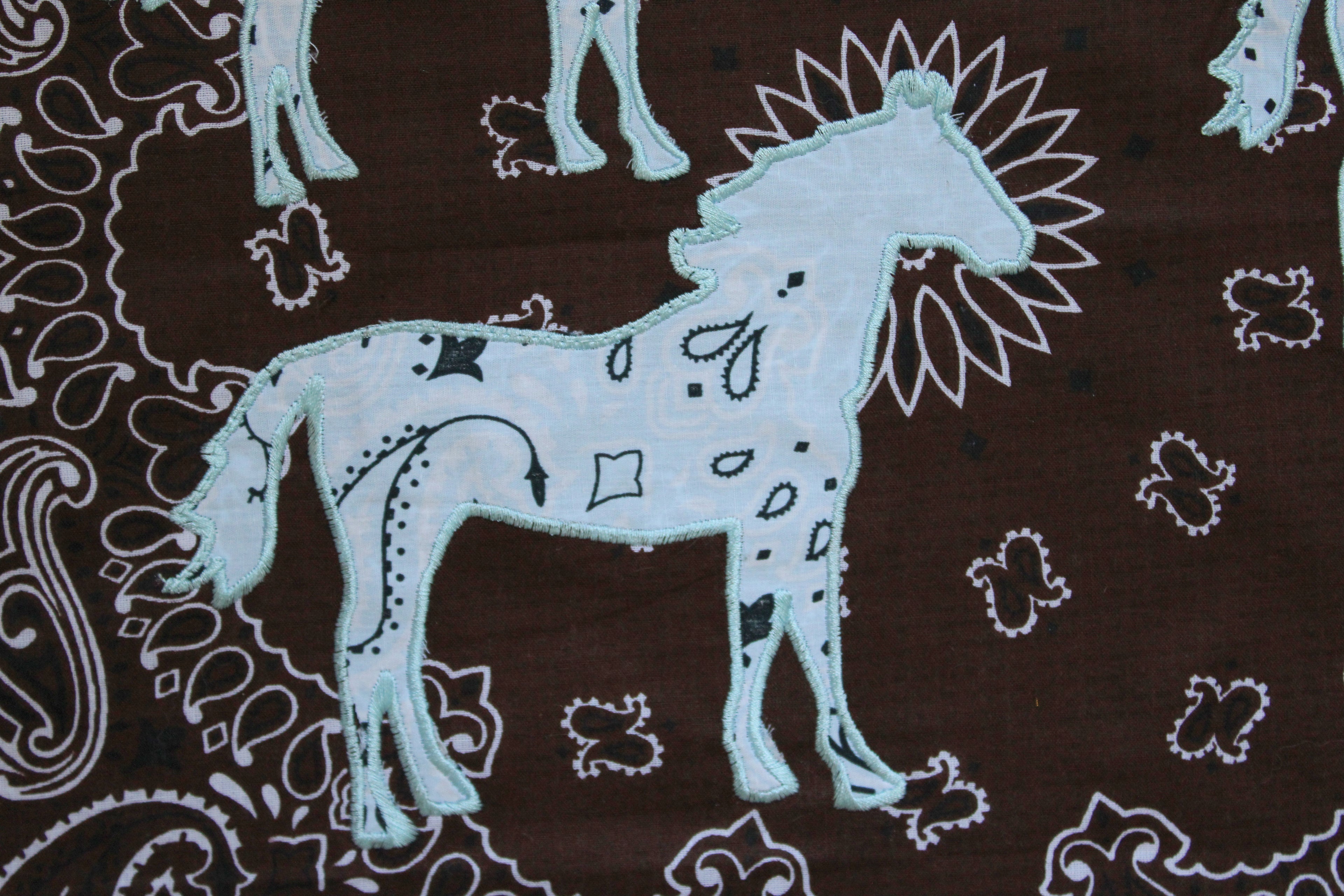 Brown and Blue Horses